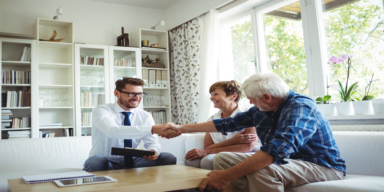 Couple hiring a Realtor to sell house